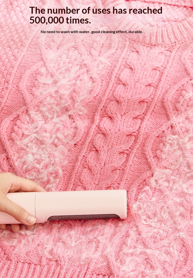 Pet hair remover demonstrated on pink fabric