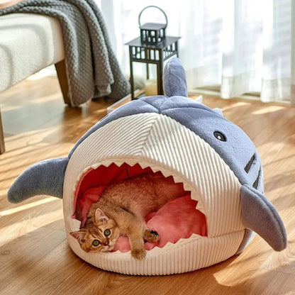 Cozy shark pet bed with enclosed sleeping space for cats