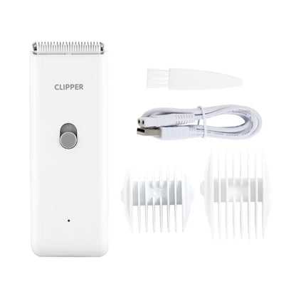 White cordless pet hair clipper with charging cable and guide combs