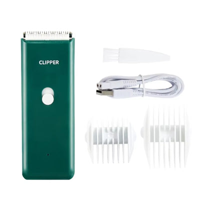 Green cordless pet hair clipper with charging cable and guide combs