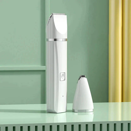 Cordless pet grooming trimmer with interchangeable heads