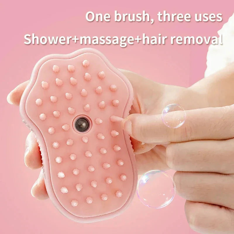 Pink pet grooming brush showing massage and hair removal functions
