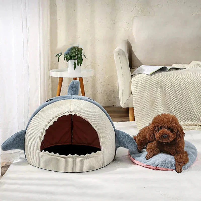 Gray shark-shaped pet bed with soft enclosed sleeping area