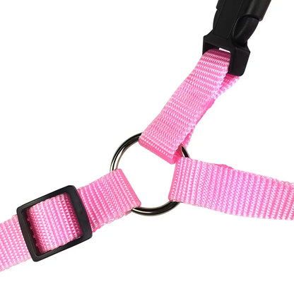 Pink adjustable pet car seat belt buckle detail